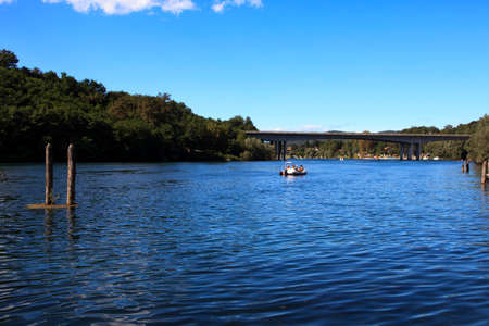 Sesto Calende (VA), Italy - September 15, 2016: The Ticino River view from a tourist boat, Lombardy, Piedmont, Italy.のeditorial素材