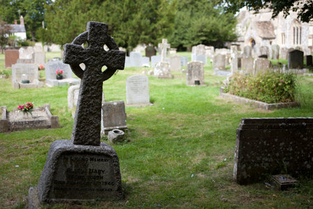 Avebury (England), UK - August 05, 2015: An old tomb in Avebury cemetery, Wiltshire , England,...