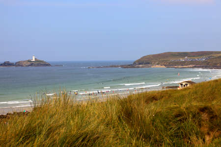 Gwithian Towans (England), UK - August 13, 2015: Rock stack beach at Gwithian Towans, Cornwall, United Kingdom.のeditorial素材