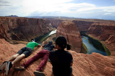 Page, Arizona / USA - August 05, 2015: Tourists at Horseshoe Bend, Colorado river, Page, Arizona, USAのeditorial素材