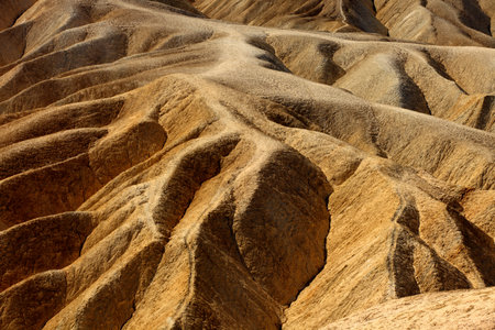 California / USA - August 22, 2015: The landscape and rock formations around Zabriskie point near...