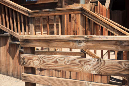 Calico, California / USA - August 23, 2015: In old wooden railing in Calico Ghost Town, Calico, California, USAのeditorial素材