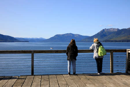 Strait Point, Alaska / USA - August 13, 2019: Tourists looking the landscape at Strait Point, Strait Point, Alaska, USAのeditorial素材