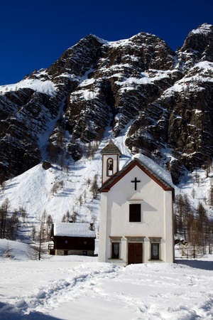 Devero Park ( Verbano-Cusio-Ossola ), Italy - January 15, 2017: The church in Crampiolo village at Alpe Devero Park, Ossola Valley, VCO, Piedmont, Italyのeditorial素材