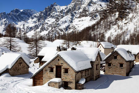 Devero Park ( Verbano-Cusio-Ossola ), Italy - January 15, 2017: Crampiolo village and houses in Alpe Devero Park, Ossola Valley, VCO, Piedmont, Italyのeditorial素材