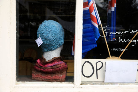 Seydisfjordur / Iceland - August 29, 2017: A dummy in a shop window at Seydisfjordur village,...