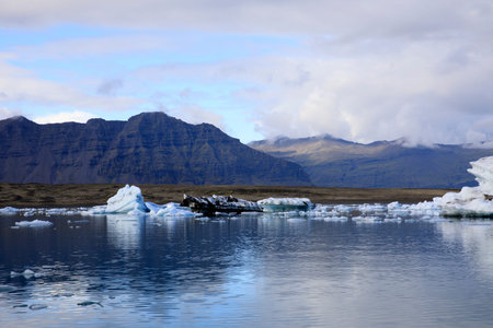 Jokulsarlon / Iceland - August 29, 2017: Ice formations and icebergs in Glacier Lagoon, Iceland,...