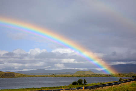 Myvatn / Iceland - August 30, 2017: A spectacular rainbow at lake Myvatn, Iceland, Europeのeditorial素材