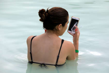 Grindavik / Iceland - August 15, 2017: Tourist relaxing in hot water at blue lagoon, Reykjavik, Iceland, Europeのeditorial素材