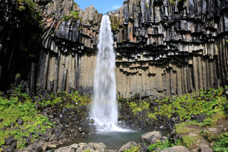 Skaftafell / Iceland - August 18, 2017: The black waterfall of Svartifoss in Skaftafell National Park, Iceland, Europeのeditorial素材