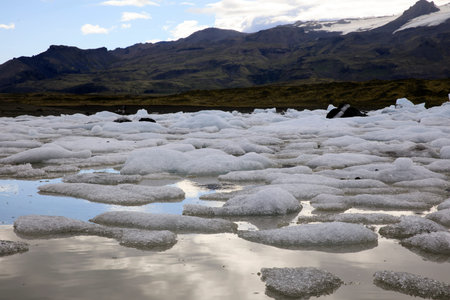 Fjallsarlon / Iceland - August 18, 2017: Fjallsarlon Glacier Lagoon view with ice formations, Iceland, Europeのeditorial素材