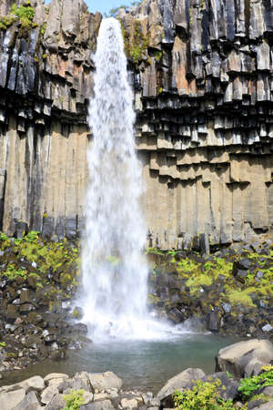 Skaftafell / Iceland - August 18, 2017: The black waterfall of Svartifoss in Skaftafell National Park, Iceland, Europeのeditorial素材