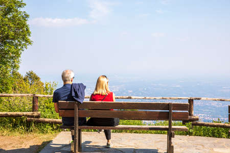 Sacro Monte (VA), Italy - June 01, 2020: Tourists look landscape at top hill at Campo dei fiori regional park, Varese, Lombardy, Italyのeditorial素材