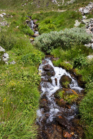 Formazza (VCO), Italy - June 25, 2020: A stream near Lake Vannino, Formazza Valley, Ossola, VCO, Piedmont, Italyのeditorial素材