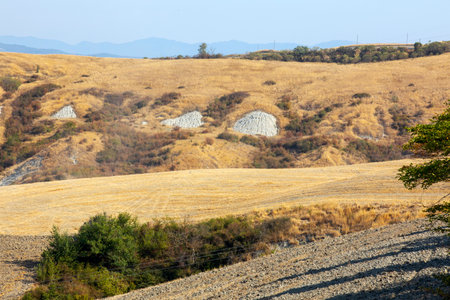 Asciano (SI), Italy - August 02, 2021: Typical scenary of Crete Senesi, Asciano, Siena, Tuscany, Italyのeditorial素材