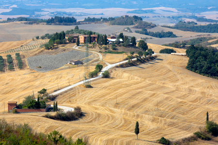 Asciano (SI), Italy - August 02, 2021: Typical scenary of Crete Senesi, Asciano, Siena, Tuscany, Italyのeditorial素材