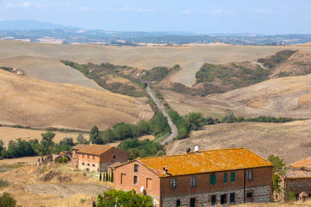 Asciano (SI), Italy - August 02, 2021: Typical scenary of Crete Senesi, Asciano, Siena, Tuscany, Italyのeditorial素材