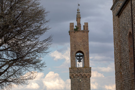 Montalcino (SI), Italy - August 15, 2021: Bell tower of Palazzo dei Priori in Montalcino village, Tuscany, Italyのeditorial素材