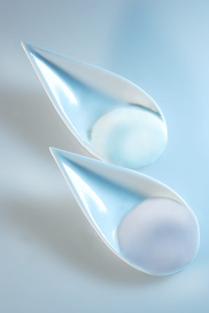 cosmetic cream in a white elegant dispense