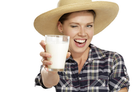 young woman  drinking milk on white