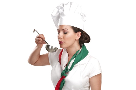 young woman chef showing ingredients for italian food on whiteの写真素材