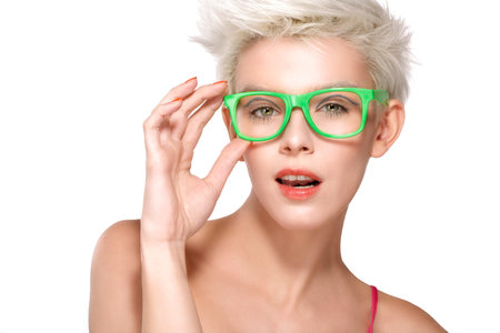 pretty young blond model wearing cool eyeglasses on white