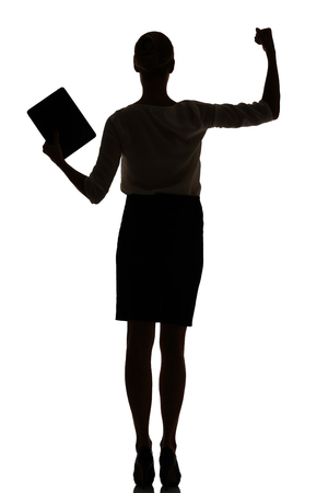 silhouette of a busy business woman backlight studio on whiteの写真素材