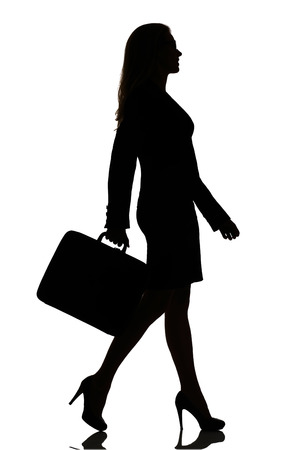 silhouette of a busy business woman backlight studio on whiteの写真素材