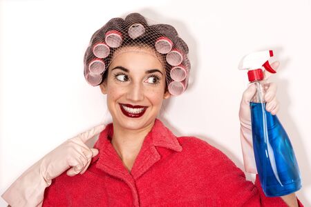 young housewife cleaning on whiteの写真素材