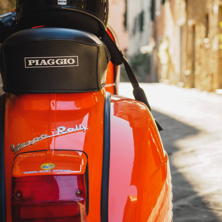Vintage Vespa Piaggio parked in a street of a Tuscan town. Italy, 2017.のeditorial素材