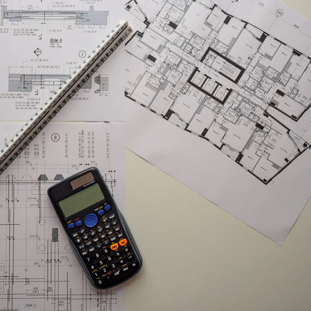 Detail view of architectural and structural construction drawings with designer tools. Square...