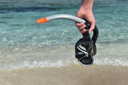 mask for diving  against the seaの写真素材