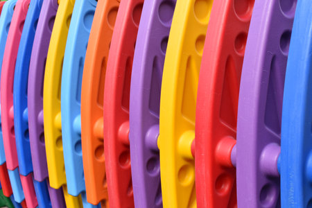 Ð¡hildren's playground with colored plastic sectionsの写真素材