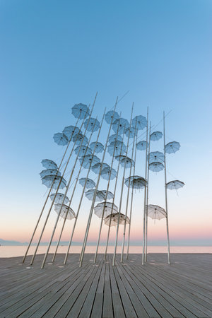 The "Umbrellas" installation at the New Waterfront of Thessaloniki during sunrise in Greece.の写真素材