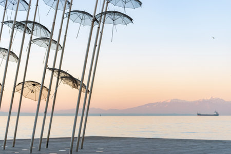 The "Umbrellas" installation at the New Waterfront of Thessaloniki during sunrise in Greece.の写真素材