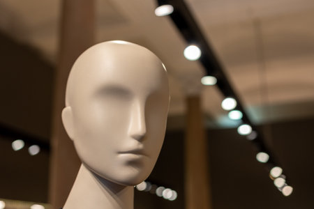 Head of a white mannequin in the store. Faceless girl.の写真素材