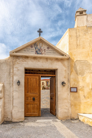 Rethymno ,Crete, Greece - March 07, 2020: View of Preveli monastery courtyard with the church of Saint John in Greece, Crete island.の写真素材