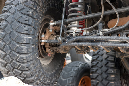 The bottom of the jeep, off-road vehicle, car on the country road, a jeep standing on the stone,...