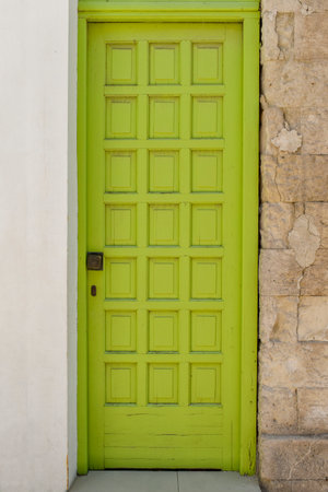 Old wooden green doorの写真素材