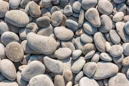 Abstract nature background with round gray pebbles.