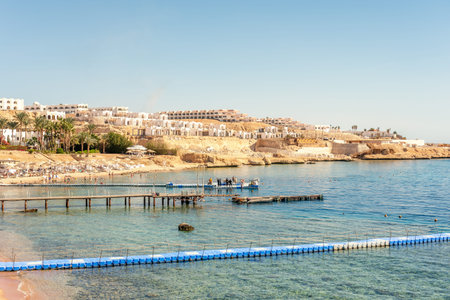 Luxury beach against the background of the beauty of the sea with coral reefs. Nice beach with beach...