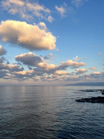 Beautiful blue sea and sky with clouds. Nature background.