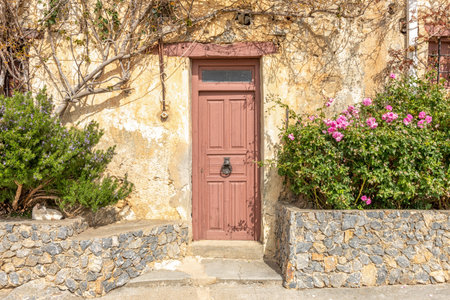 Old wooden brown door in Rethymnon. Greece.の写真素材