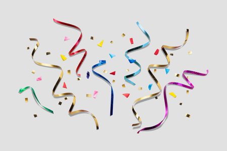 Creative composition made with party streamers on bright background. Minimal celebration party concept.の写真素材