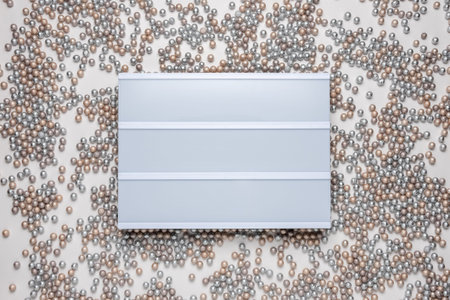 Empty lightbox with decorative balls over white background. Mockup concept.