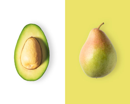 Creative layout made of avocado and pear. Flat lay. Food vegan concept.