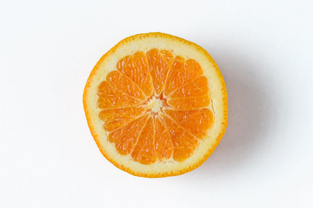 Slice of fresh orange on white background.
