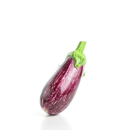 Ripe graffiti eggplant isolated on a white background. Food concept.の写真素材