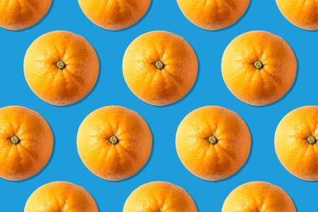 Creative layout made of oranges. Flat lay. Food vegan concept.