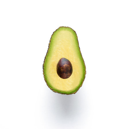 Sliced avocado isolated on white background. Minimal concept.の写真素材